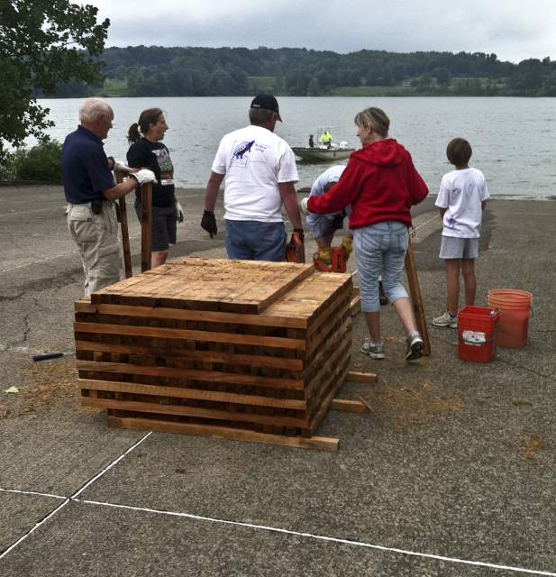 Agencies and volunteers partnered to build and install 20 crib structures for fish habitat in Pennsylvania's Woodcock Creek Lake (Credit: Jason Bowers/USACE, via Flickr)