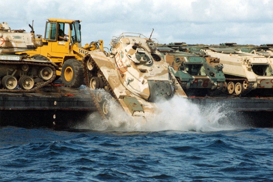 A tank being sunk into the water to create an artificial reef